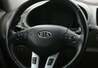 Подержанный автомобиль Kia Sportage 2010 года (20 фото)