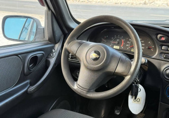 Подержанный автомобиль Chevrolet Niva 2011 года (14 фото)