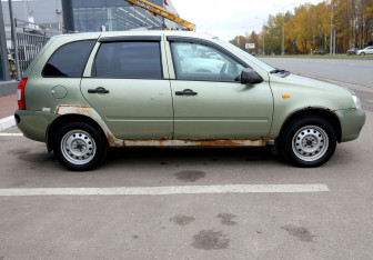 Подержанный автомобиль LADA (ВАЗ) Kalina Wagon 2011 года (7 фото)
