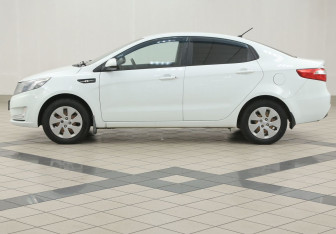 Подержанный автомобиль Kia Rio Sedan 2013 года (7 фото)