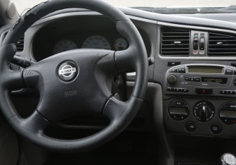 Подержанный автомобиль Nissan Primera Sedan 2001 года (14 фото)
